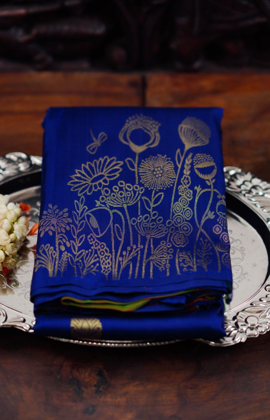 Blue Uppada pattu with floral border