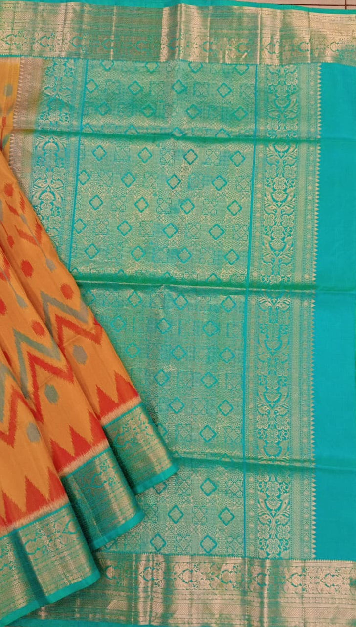 Mustard yellow Soft Silk Saree with teal gold zari pallu